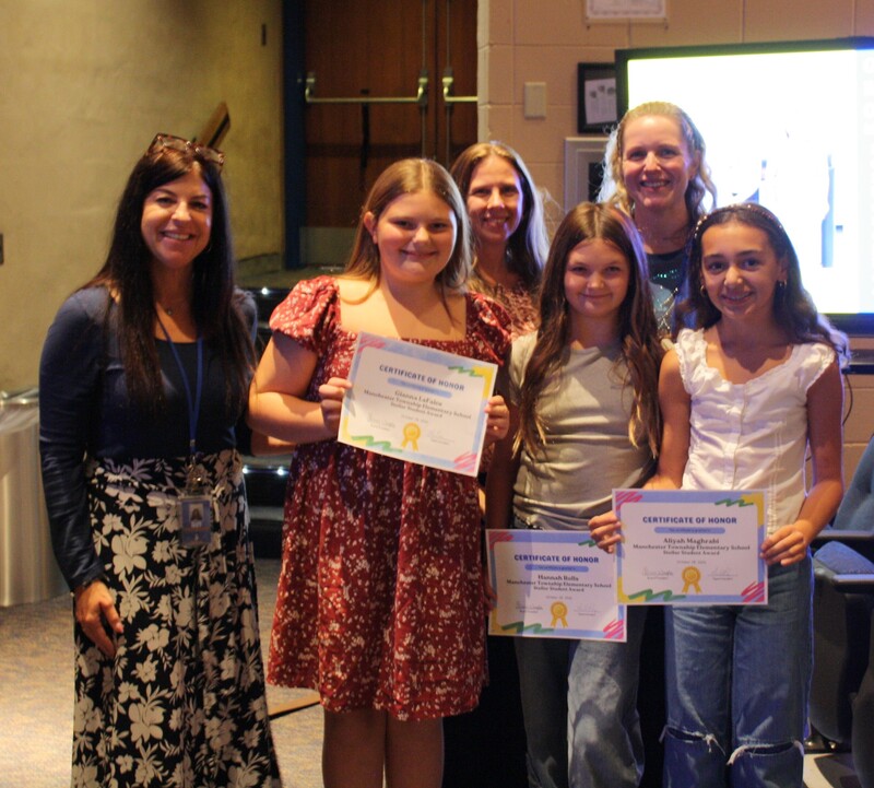 MTES students of the month receiving recognition at the BOE meeting