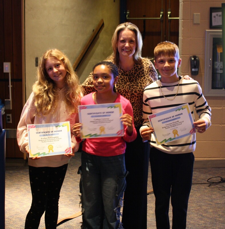 RES students of the month receiving recognition at the BOE Meeting