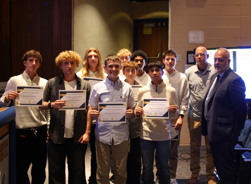 MTHS Boys XC receiving recognition at the BOE meeting