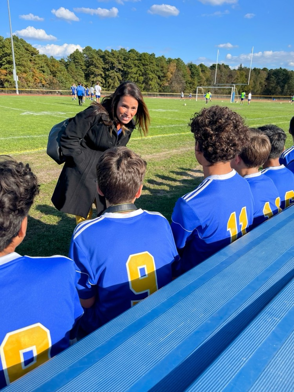 superintendent Pedroza congratulates the team