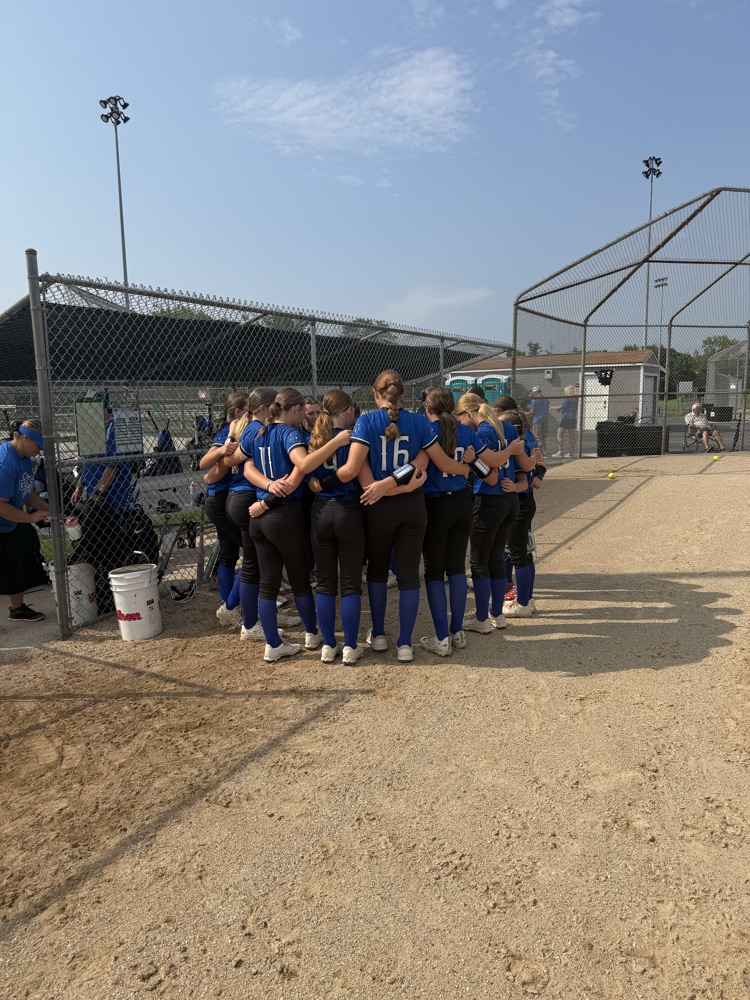 girls softball huddle