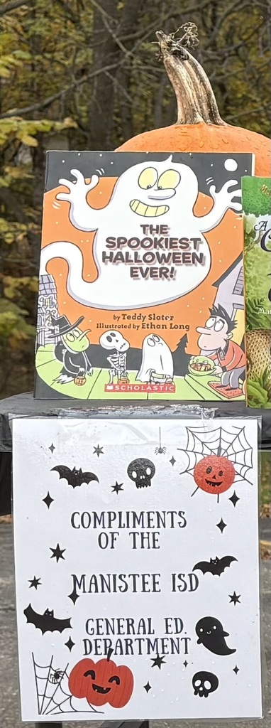 The General Education Department had a great time passing out books to the trunk or treaters at Bear Lake.on Halloween.