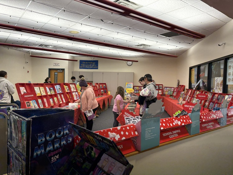 parents and students shop at the Book Fair