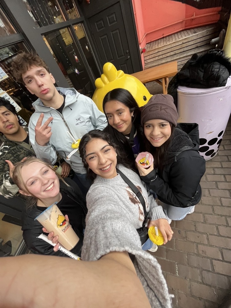 Six Manson studnets drink bubble tea in downtown Seattle.