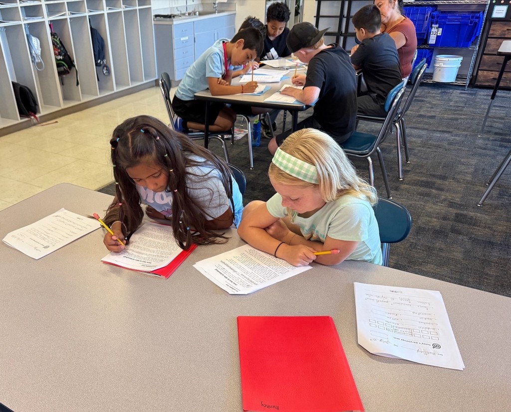 Two girls reading
