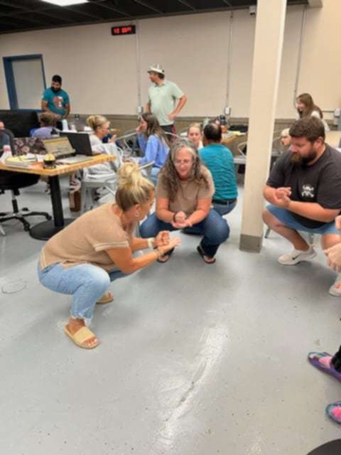 Teachers participate in 7 habits of highly effective people training.