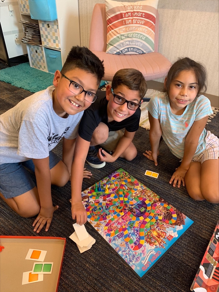 Kids playing Candyland.