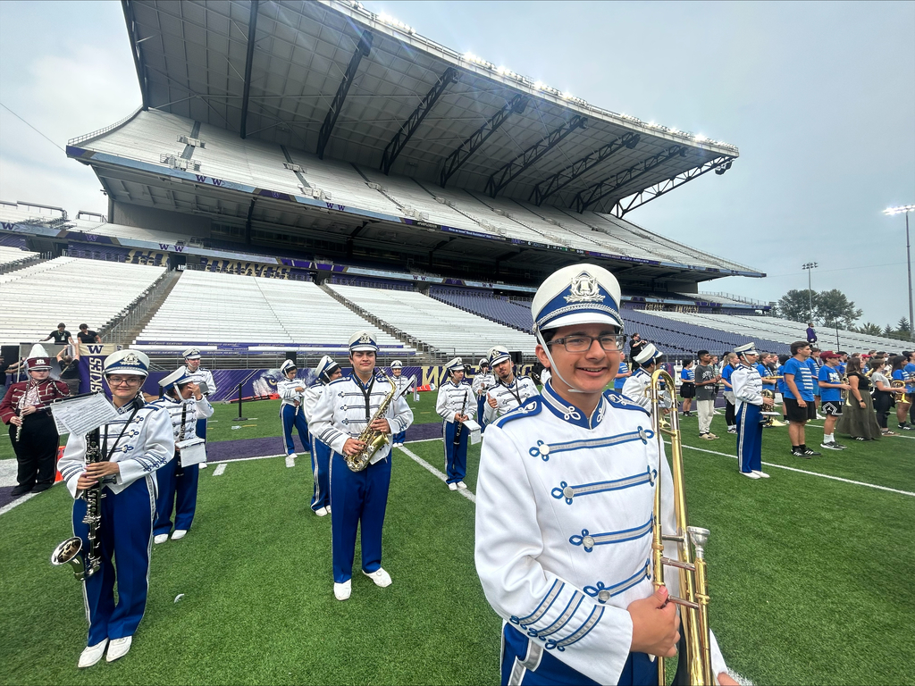 Manson Band members on Husky Field.
