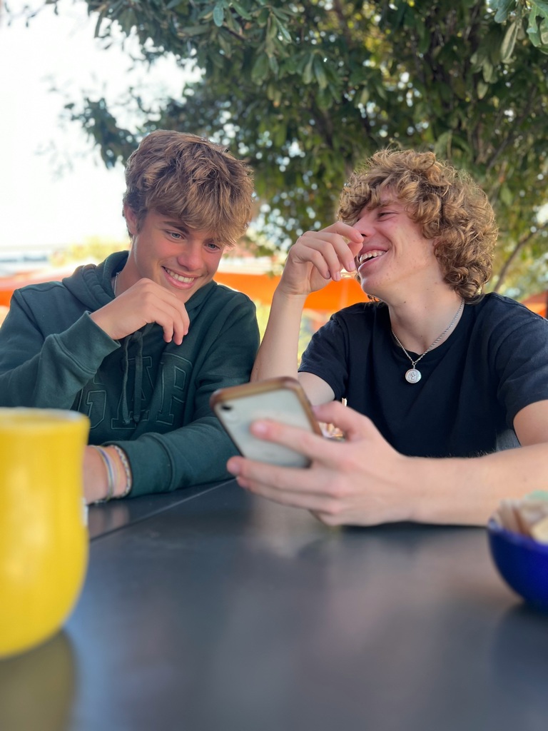 Teen boys talking.