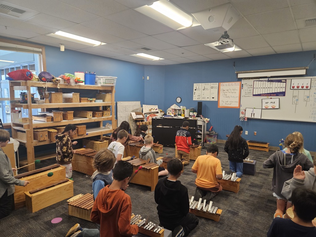 5th grade students drumming.