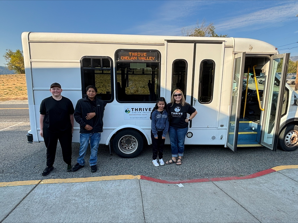 Thrive bus with student riders.