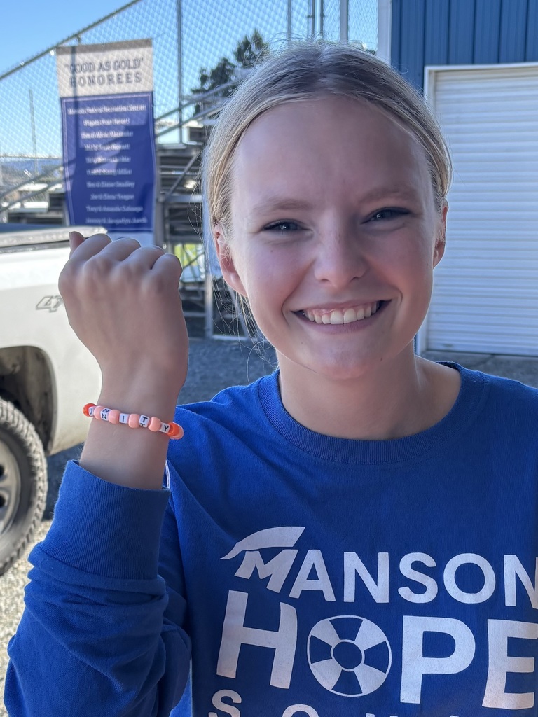 Student sharing Unity bracelet made at Hope Squad event.