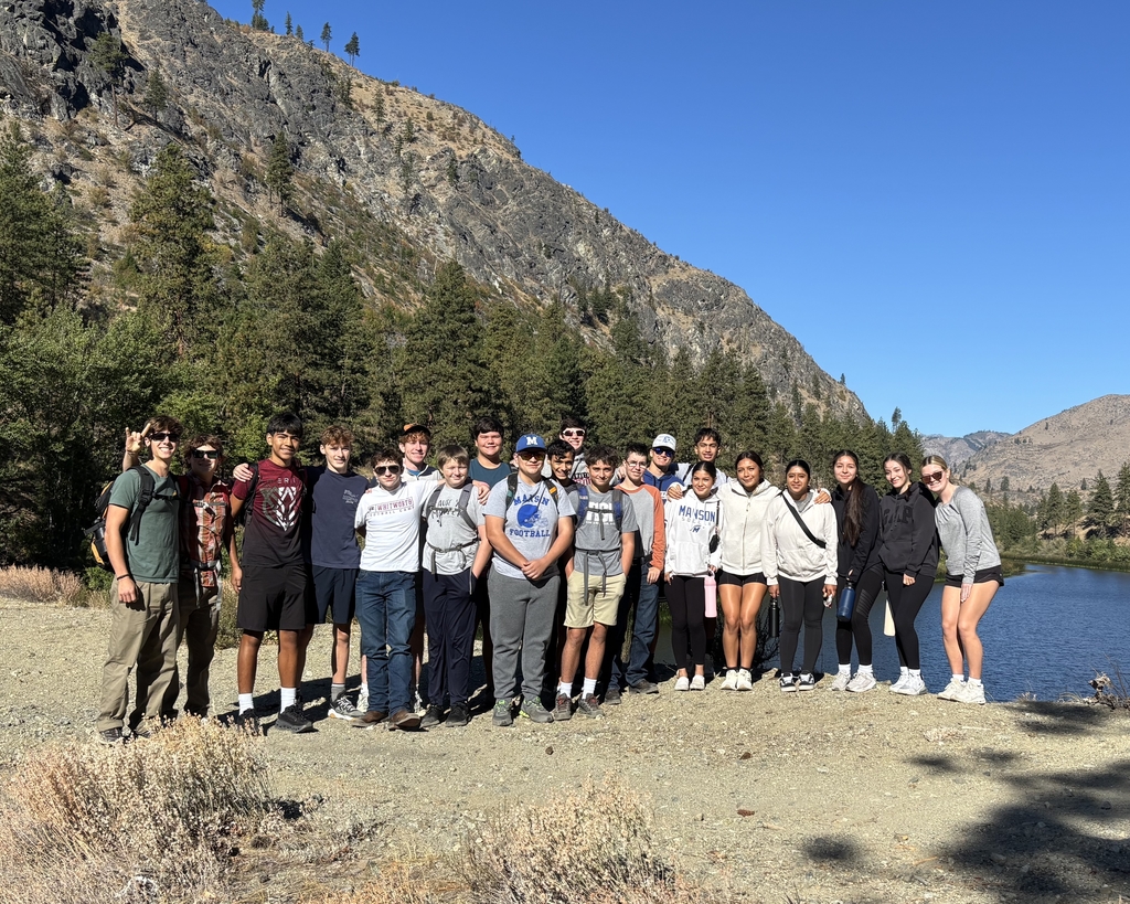 Students posing at the bottom of 4th of July Peak.