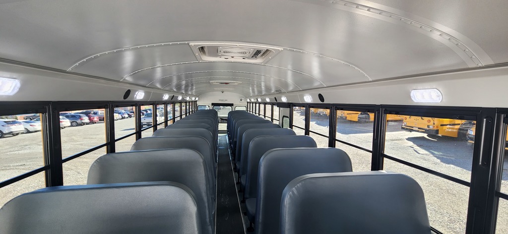 Interior shot of bus school bus seats.