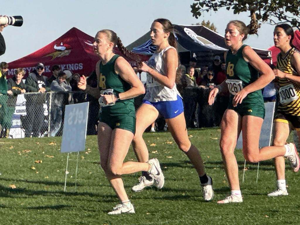 Manson runner in pack of other runners at state race.
