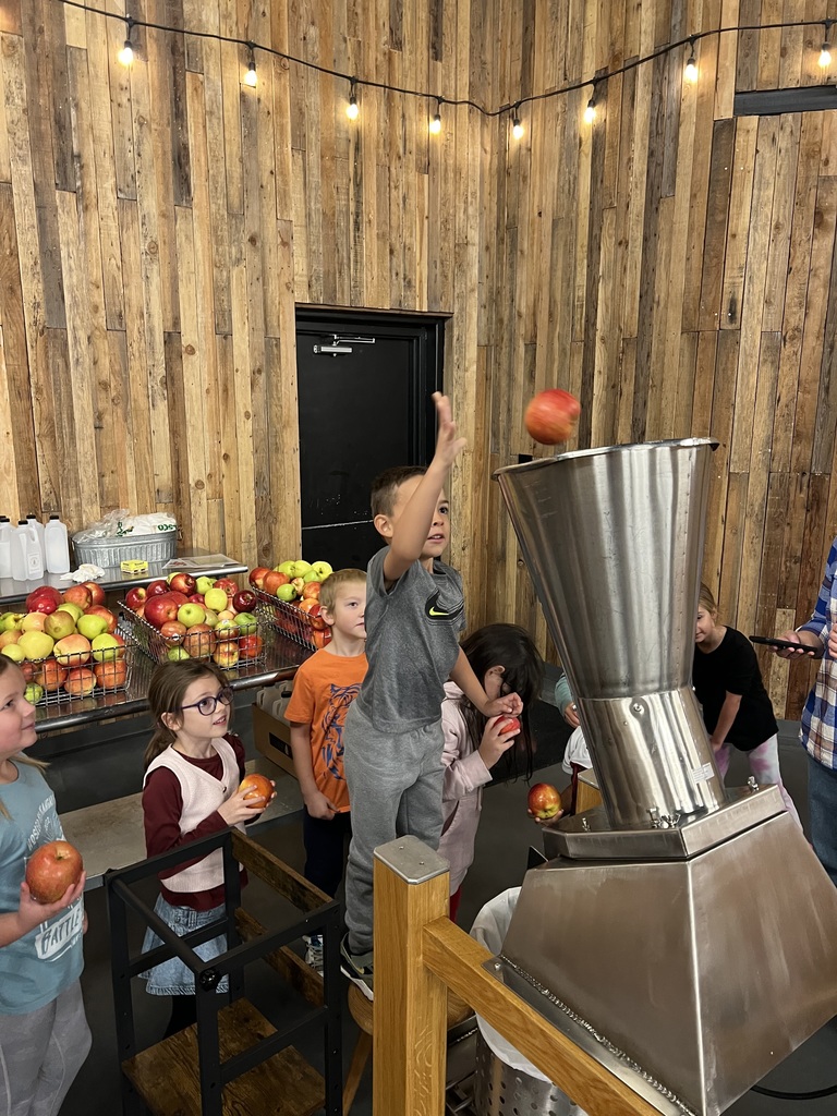 Tossing an apple in the press.