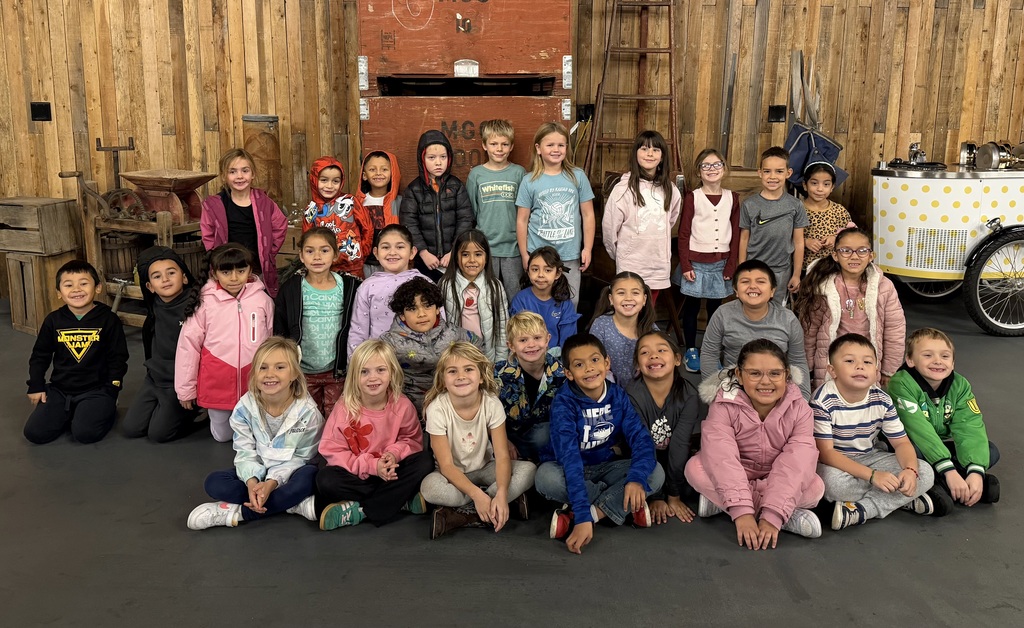 Mrs. Valdovinos' students pose for a class photo at Ciderpress.