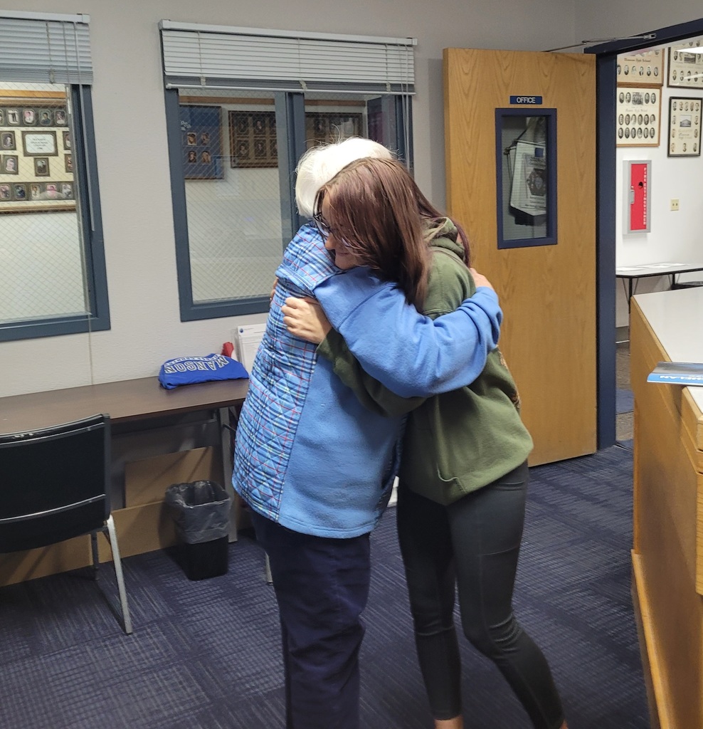 Samantha  Willoughby receives a hug.