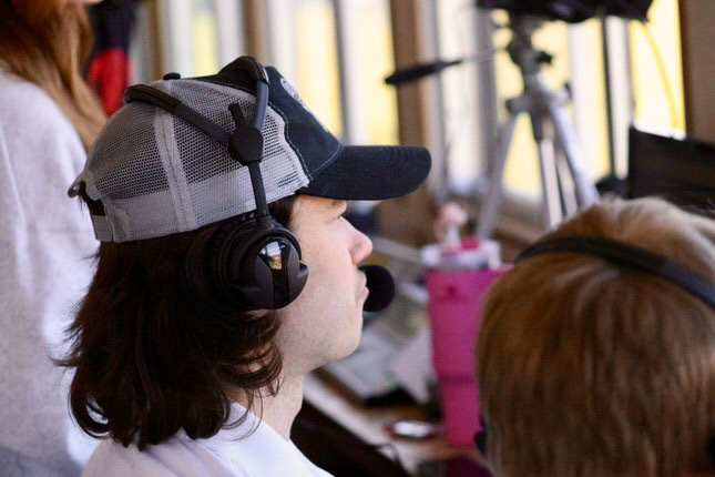 Ryan Gildersleeve wearing headphones.