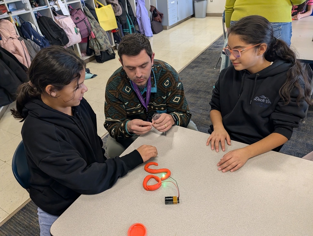 CVCH instructor works with student on heart activity.