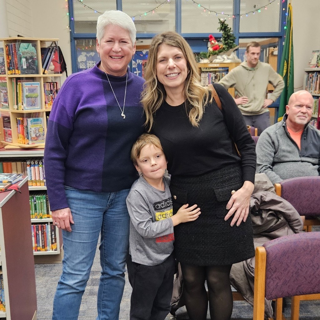 Incoming board member poses with outgoing board member. 