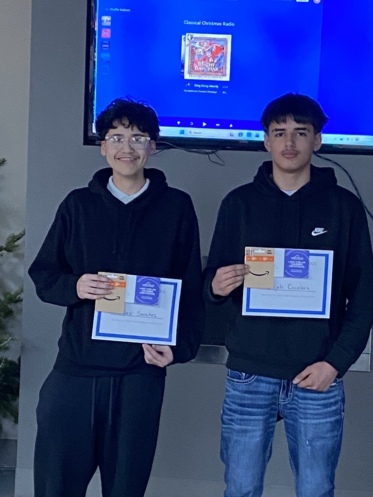 Third place winners with their certificates.