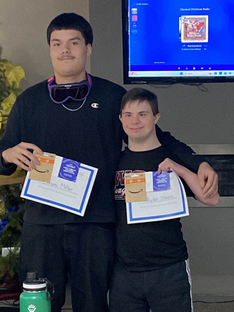 First place Shark Tank winners with their awards.