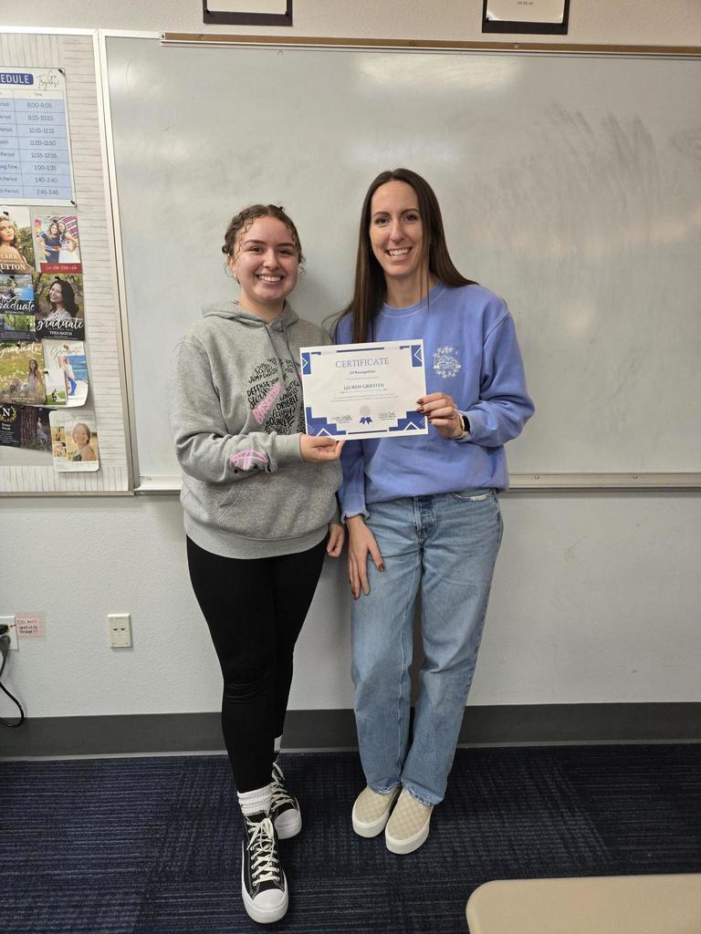 Mrs. Griffith holds her G3 award.