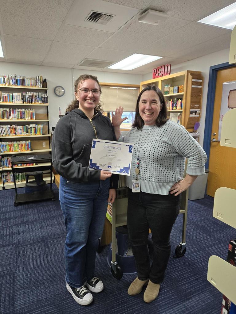 Mrs. Brown receives her G3 award.