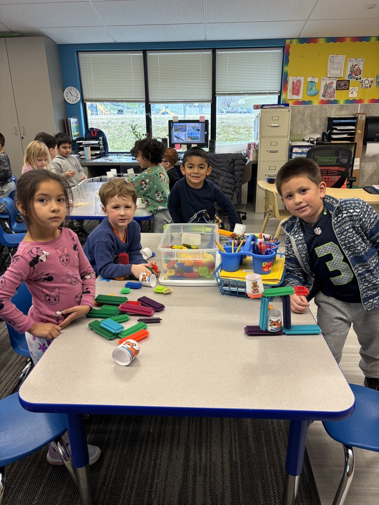 TTK student build bridges out of colored blocks.
