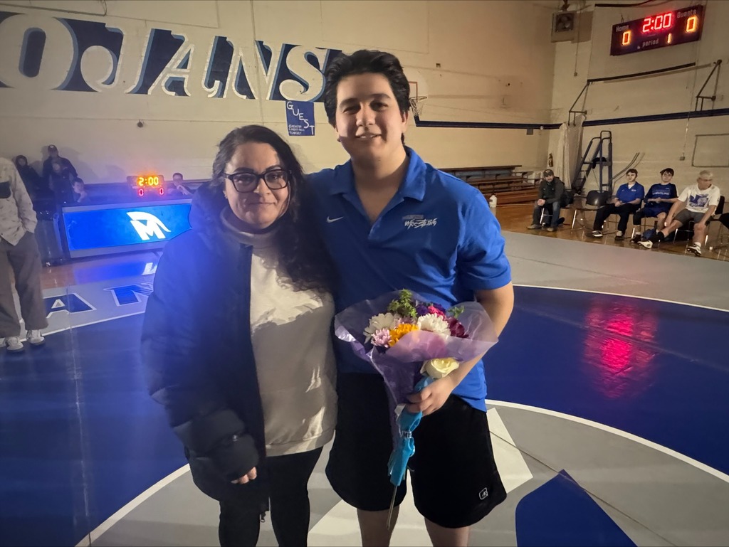 A senior wrestler and his mother.
