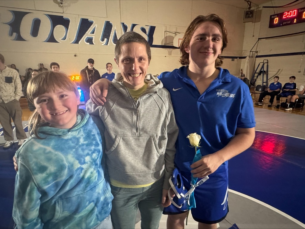 Senior wrestlers with folks.