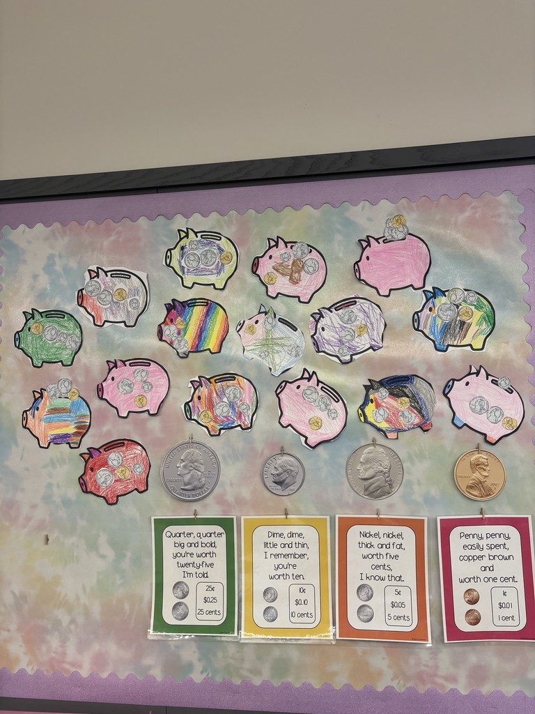 Piggy banks an d coin rhymes on a bulletin board