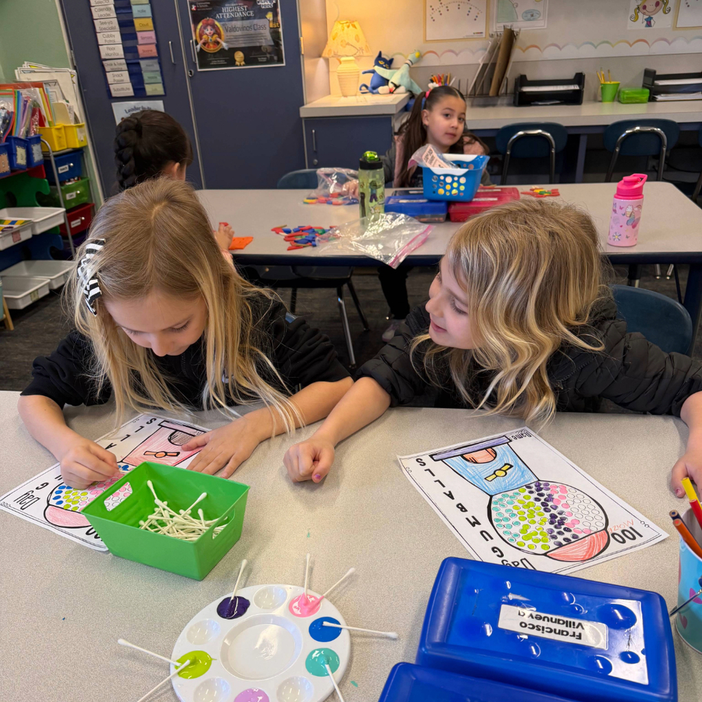 First grade students participating in 100th day of school activities