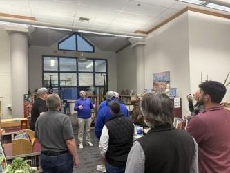 Members of the task force tour Manson elementary library 