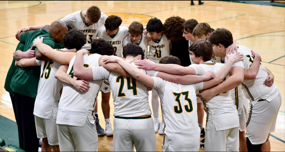 Bobwhite Basketball Team huddle