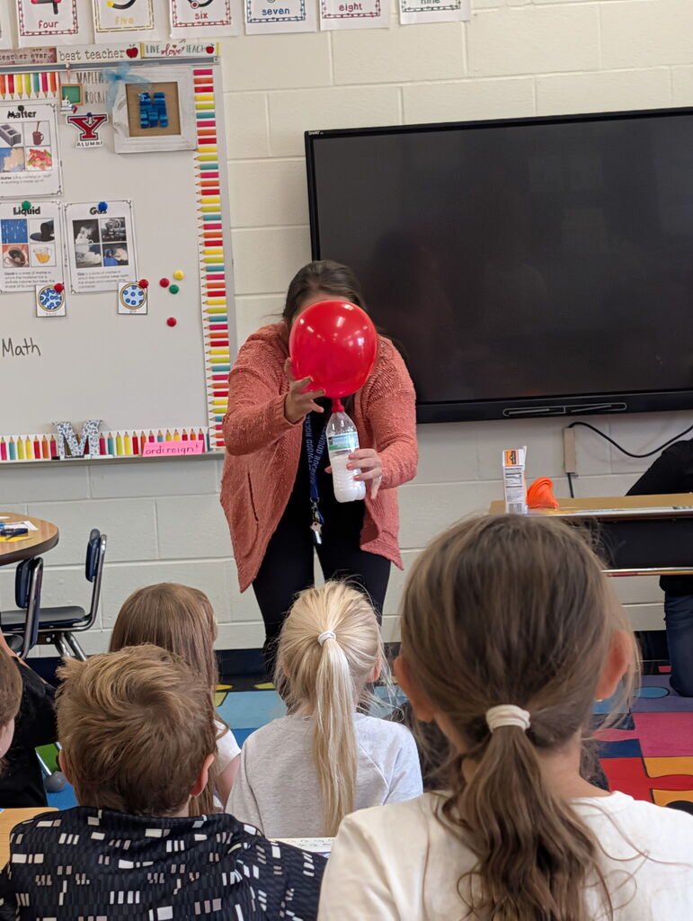 🧪 Science was extra sweet in 2nd grade earlier this week! 🚀  Our 2nd graders spent time learning all about solids, liquids, and gases through some fun, hands-on experiments!  🎈 Students observed the Magic Inflating Balloon Experiment, where they watched baking soda and vinegar react to create carbon dioxide gas, inflating a balloon right before their eyes!  🍫 In celebration of National Chocolate Covered Pretzel Day, students continued their learning with a delicious science experiment! They observed solid chocolate melt into a liquid and then watched it turn back into a solid as it cooled.  Of course, the best part was getting to enjoy some delicious chocolate-covered pretzels generously donated by Daffin’s Candies! 🥨🍫  A huge THANK YOU to Daffin’s for providing such a yummy treat for our students and helping us make science learning extra sweet! 