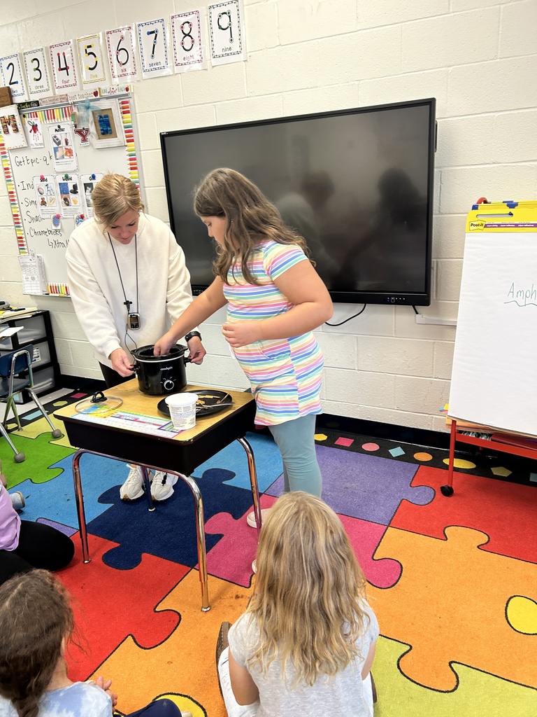 π§ͺ Science was extra sweet in 2nd grade earlier this week! π Our 2nd graders spent time learning all about solids, liquids, and gases through some fun, hands-on experiments! π Students observed the Magic Inflating Balloon Experiment, where they watched baking soda and vinegar react to create carbon dioxide gas, inflating a balloon right before their eyes! π« In celebration of National Chocolate Covered Pretzel Day, students continued their learning with a delicious science experiment! They observed solid chocolate melt into a liquid and then watched it turn back into a solid as it cooled. Of course, the best part was getting to enjoy some delicious chocolate-covered pretzels generously donated by Daffinβs Candies! π₯¨π« A huge THANK YOU to Daffinβs for providing such a yummy treat for our students and helping us make science learning extra sweet!