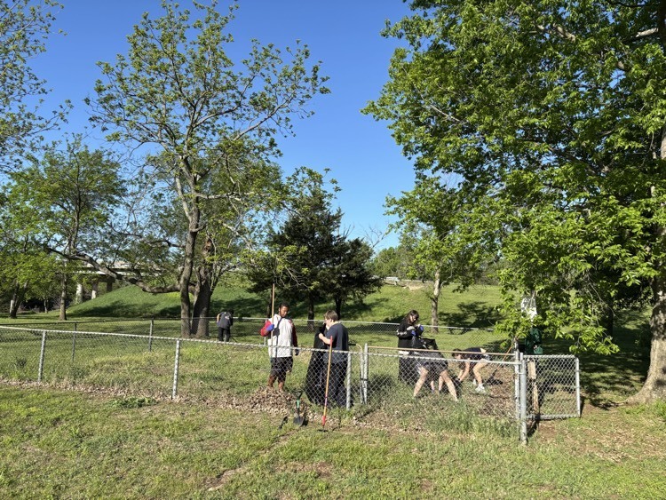 MdCV Students cleaning at the railroad park. 