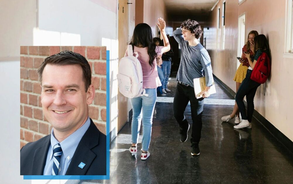 Eldrich Carr inset headshot on picture of students in the hall 
