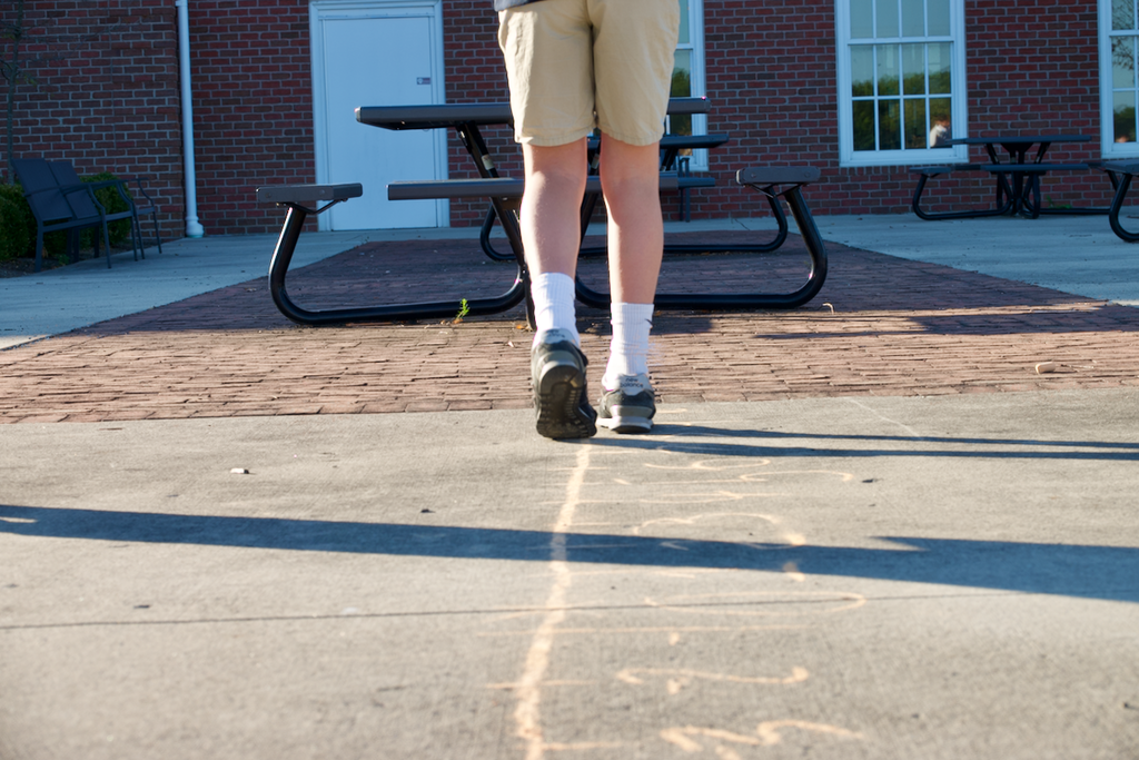 Middle division Number Line Activity student walking on line