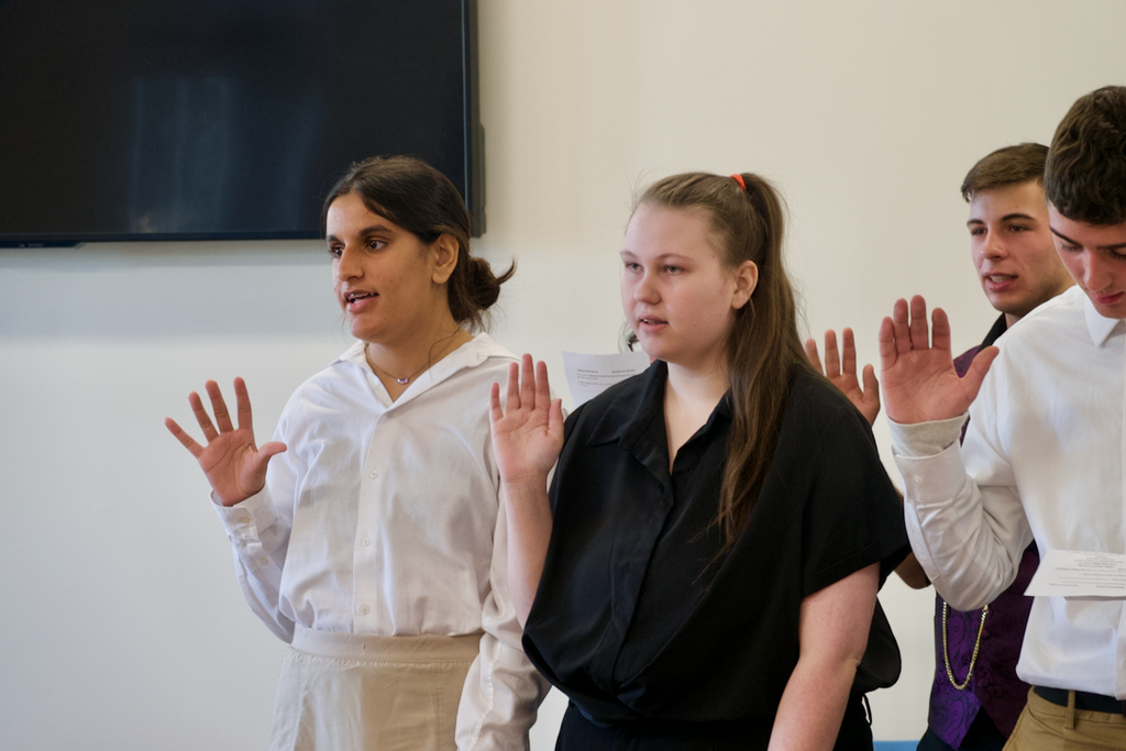 Students taking the NHS pledge at Marburn Academy