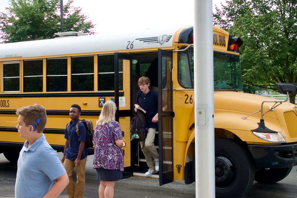 First Day - students getting off the bus