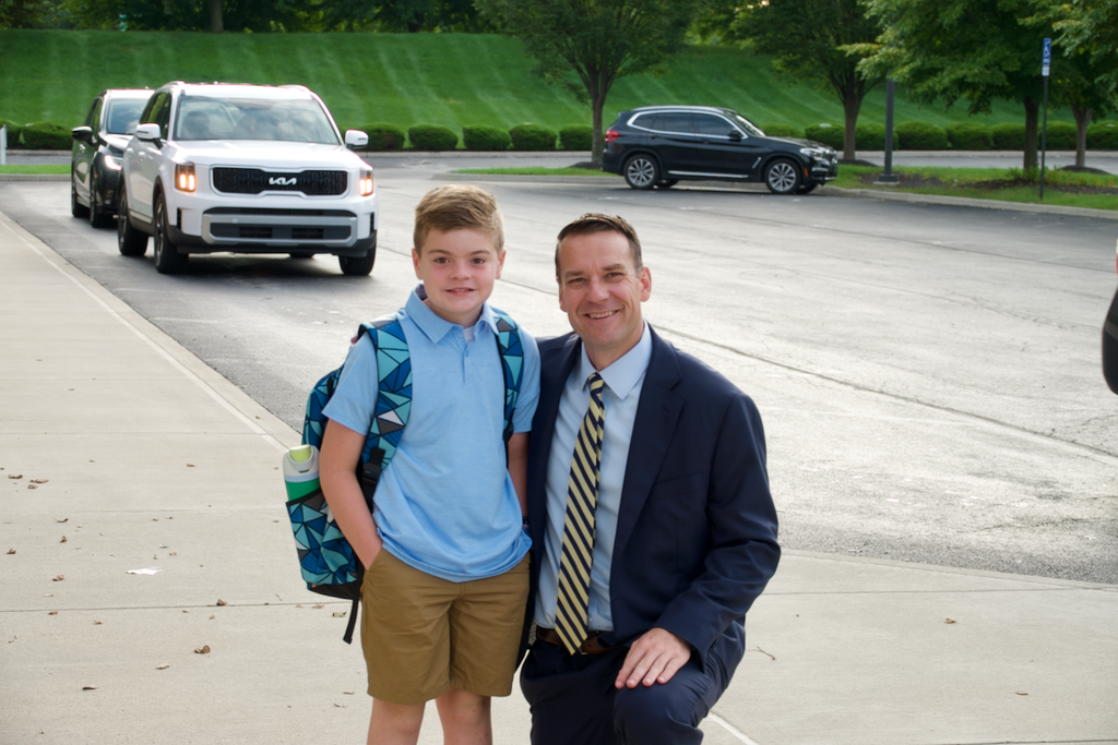 First Day - Head of school posed with student