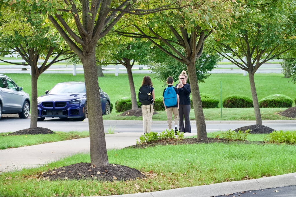 First Day - Parent taking a picture of studets
