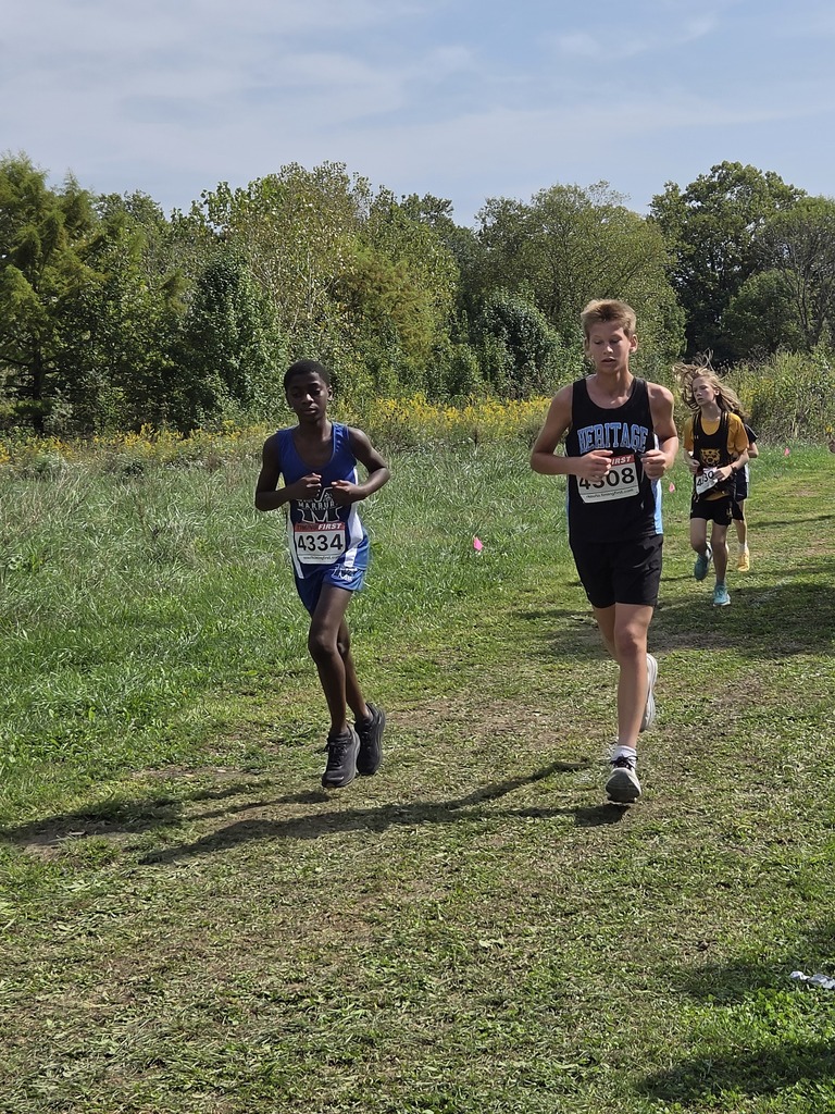 Middle Division student running in cross country meet