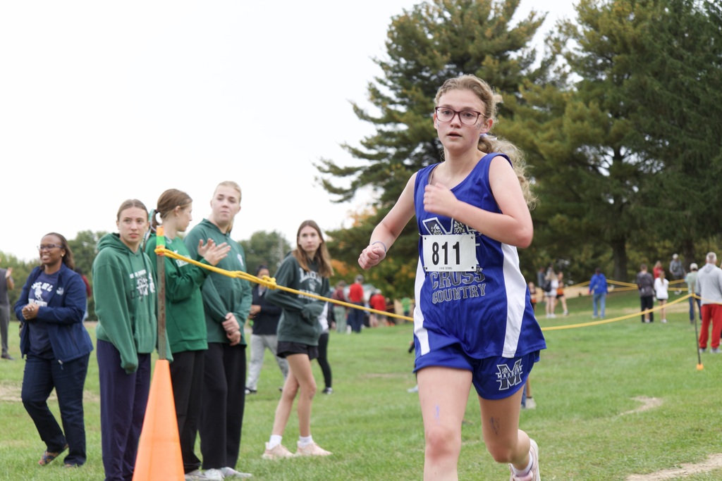 Middle Division student running in cross country meet