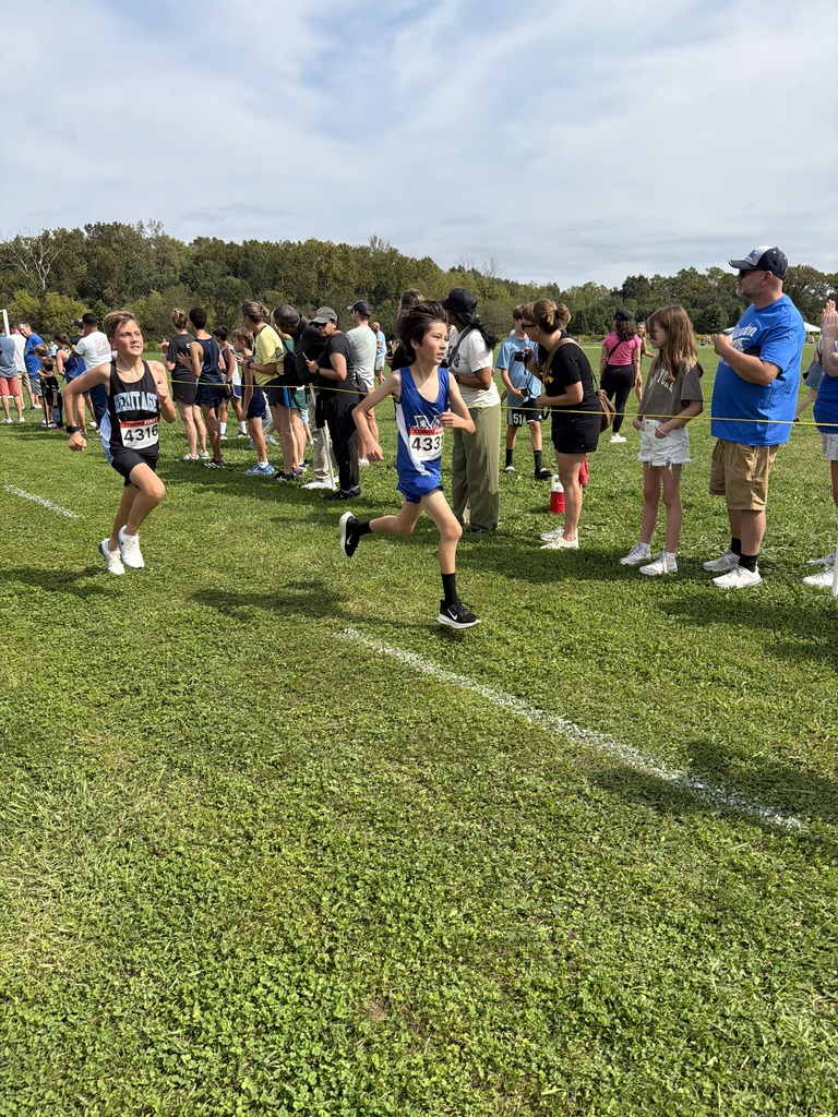 Marburn Academy Middle Division student running in cross country meet