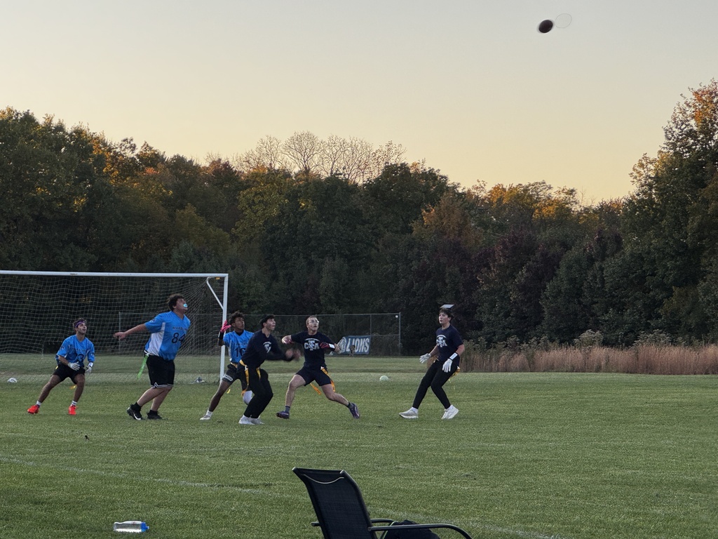 Players going after the catch in Marburn flag football game.