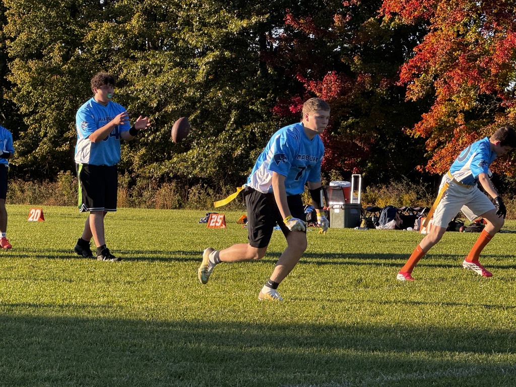 Marburn player running a route in flag football